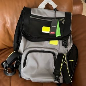 Tumi backpack almost new, with tags